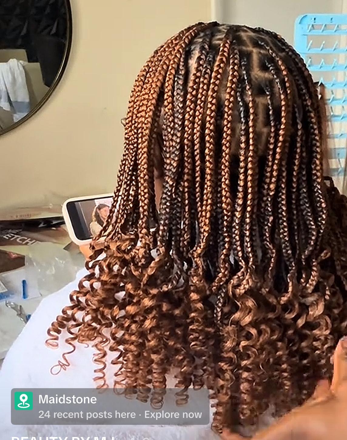 Brown braids with curly ends